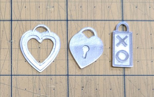 Judy Larson's Hearts and Flowers Charms - , Classic Wire Jewelry, Cutting, Cutting Tool, Cutters, Filing, Finishing, Butane Torch, Soldering, Solder, Design, Remove excess paste with wood 